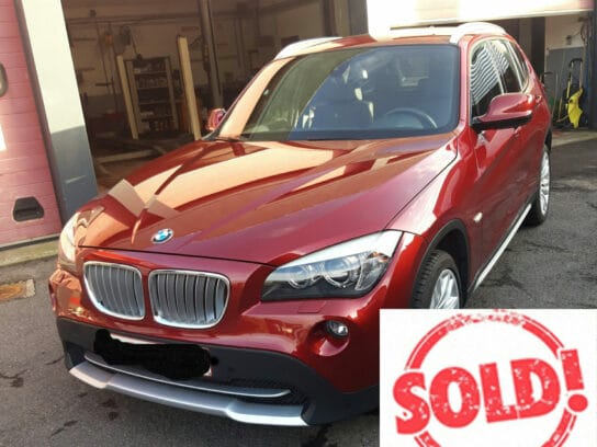 rode BMW verkocht